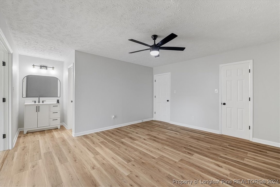 7847 Amesbury Road Fayetteville, NC 28311 - Photo 20 of 42 a view of a livingroom with a flat screen tv