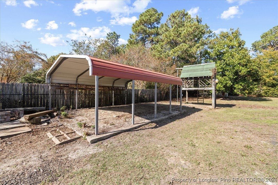 7847 Amesbury Road Fayetteville, NC 28311 - Photo 35 of 42 a view of backyard with wooden fence