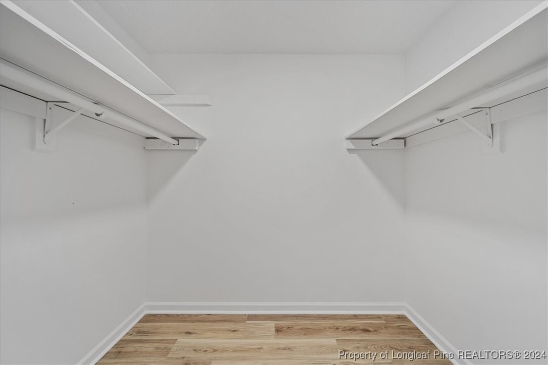 7847 Amesbury Road Fayetteville, NC 28311 - Photo 42 of 42 a view of a room with racks on the wall