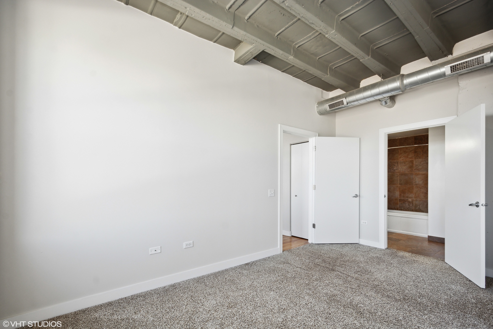 1791 West Howard Street, Unit 504 Chicago, IL 60626 - Photo 12 of 23 an empty room with windows