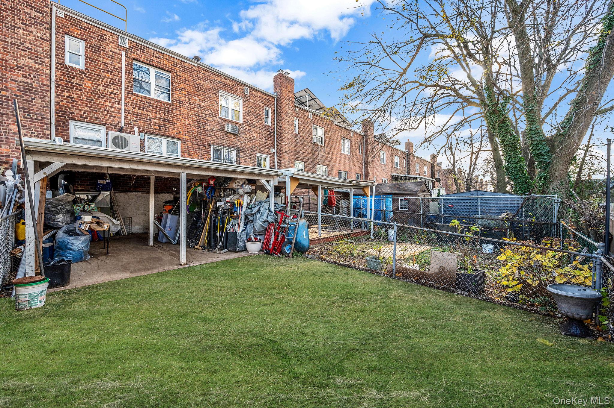 179-49 Eveleth Road Queens, NY 11434 - Photo 4 of 17 a view of a swimming pool with a patio