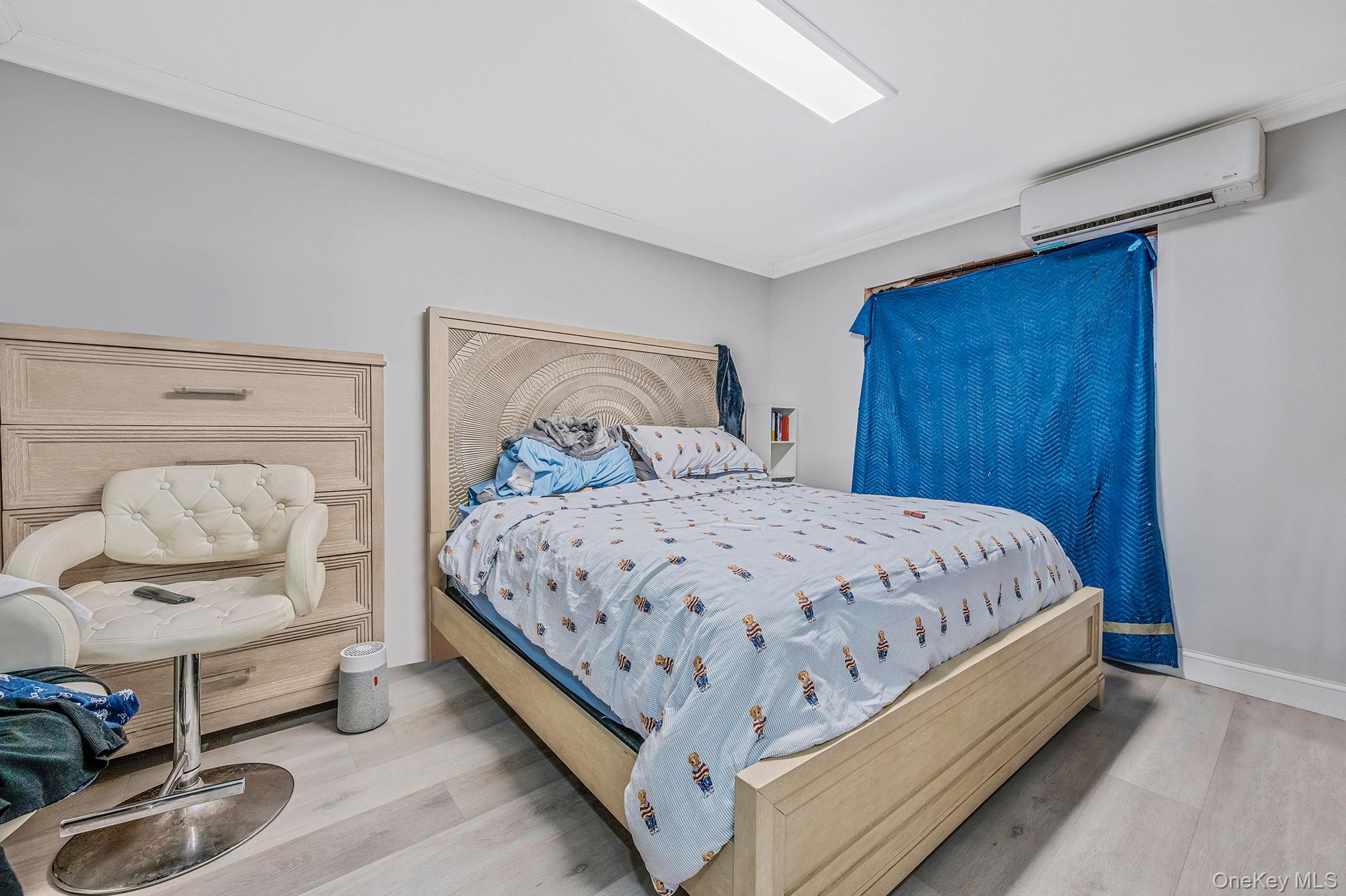 179-49 Eveleth Road Queens, NY 11434 - Photo 9 of 17 a bedroom with a bed and closet