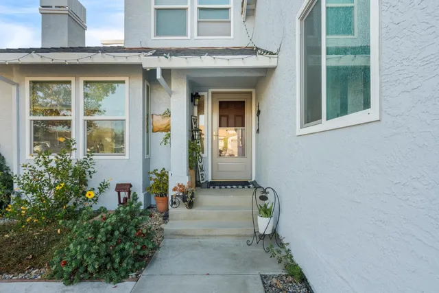 a front view of a house with a porch