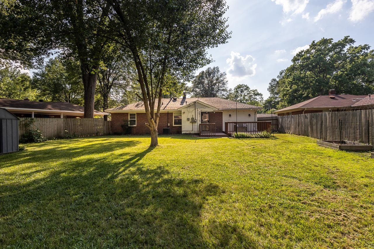 1604 Dearing Road Memphis, TN 38117 - Photo 18 of 18 a house view with swimming pool in front of it