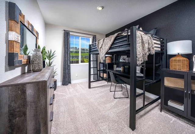 a view of a livingroom with furniture and a hardwood floor
