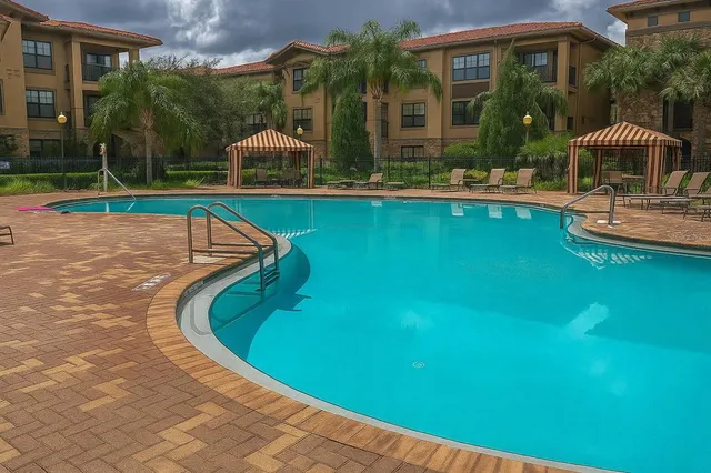 a balcony with table and chairs