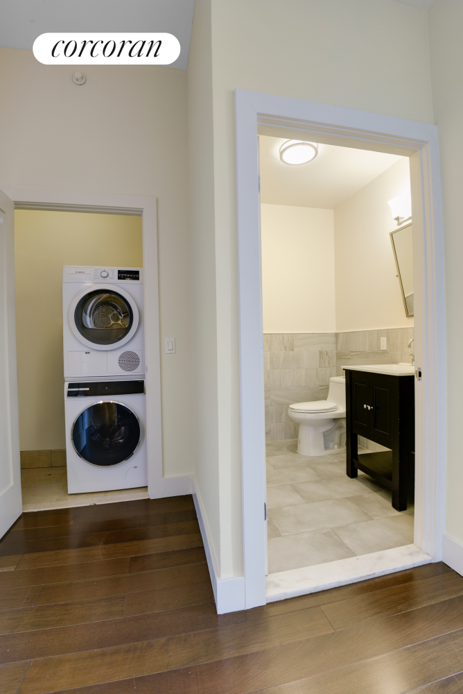380 Lenox Avenue, Unit PHC Manhattan, NY 10027 - Photo 11 of 15 a bathroom with a sink and a mirror