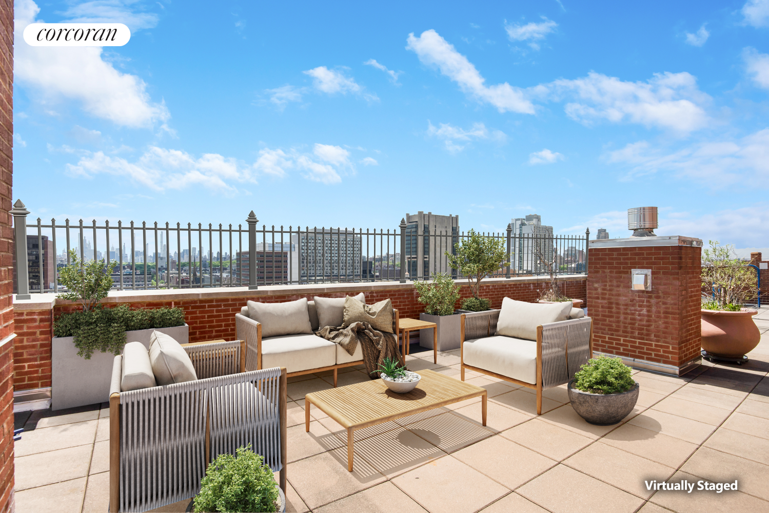 380 Lenox Avenue, Unit PHC Manhattan, NY 10027 - Photo 12 of 15 a roof deck with couches and potted plants