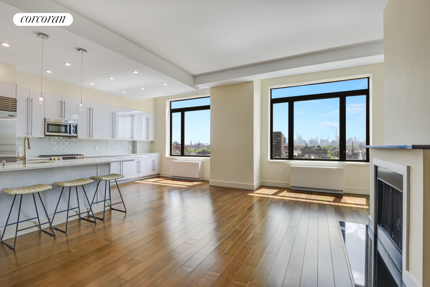 380 Lenox Avenue, Unit PHC Manhattan, NY 10027 - Photo 2 of 15 a view of a kitchen with dining table and chairs