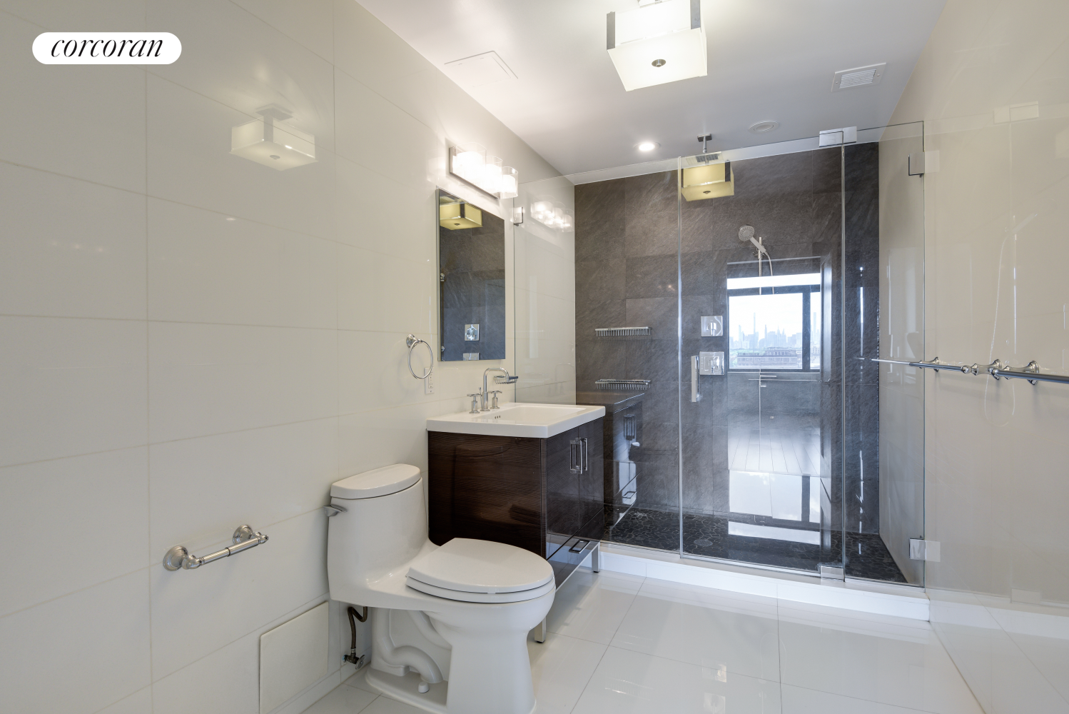 380 Lenox Avenue, Unit PHC Manhattan, NY 10027 - Photo 9 of 15 a bathroom with a sink toilet and shower
