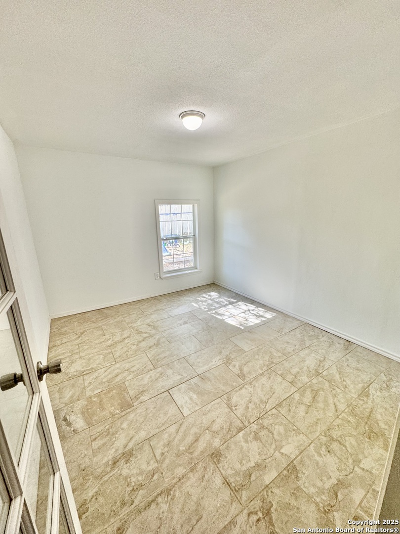 22739 Lazy Stream Drive Elmendorf, TX 78112 - Photo 14 of 20 a view of an empty room