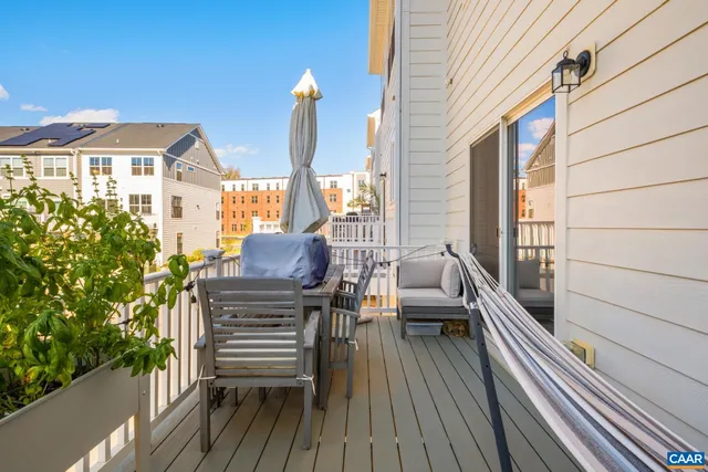a view of balcony with chairs