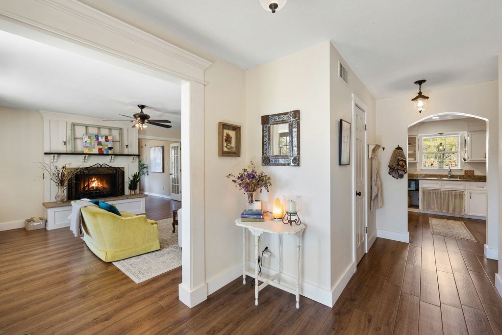 290 Sunset Ridge Dripping Springs, TX 78620 - Photo 12 of 39 Hall with dark wood-type flooring and arched walkways