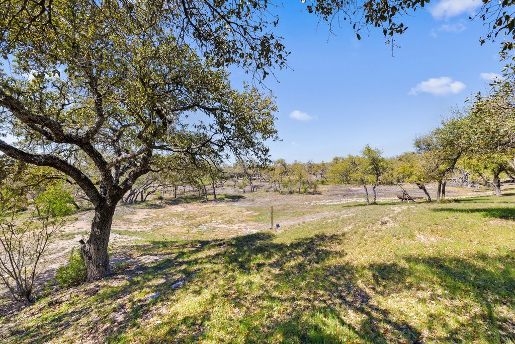 290 Sunset Ridge Dripping Springs, TX 78620 - Photo 24 of 39 View of grassy yard
