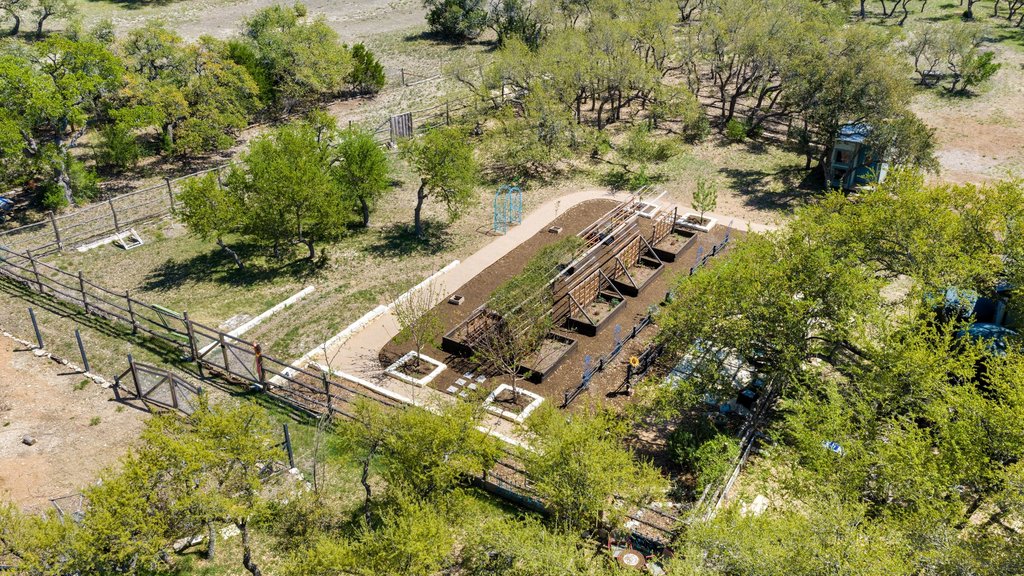 290 Sunset Ridge Dripping Springs, TX 78620 - Photo 33 of 39 a view of a yard with chairs