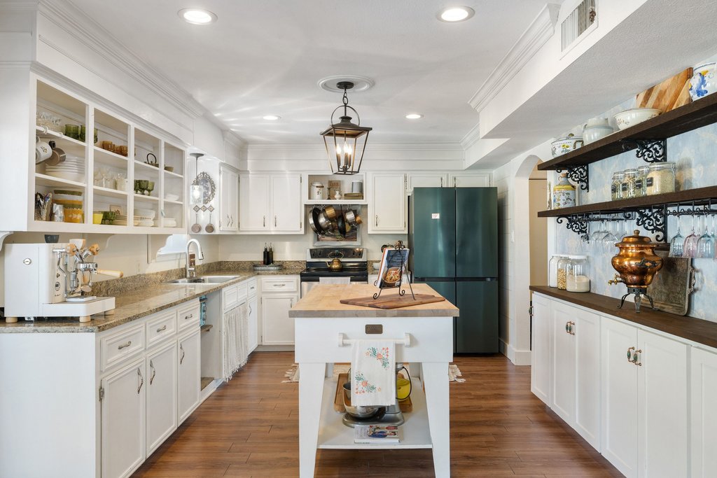 290 Sunset Ridge Dripping Springs, TX 78620 - Photo 7 of 39 Kitchen with open shelves, white cabinetry, freestanding refrigerator, electric stove, and dark wood-style flooring