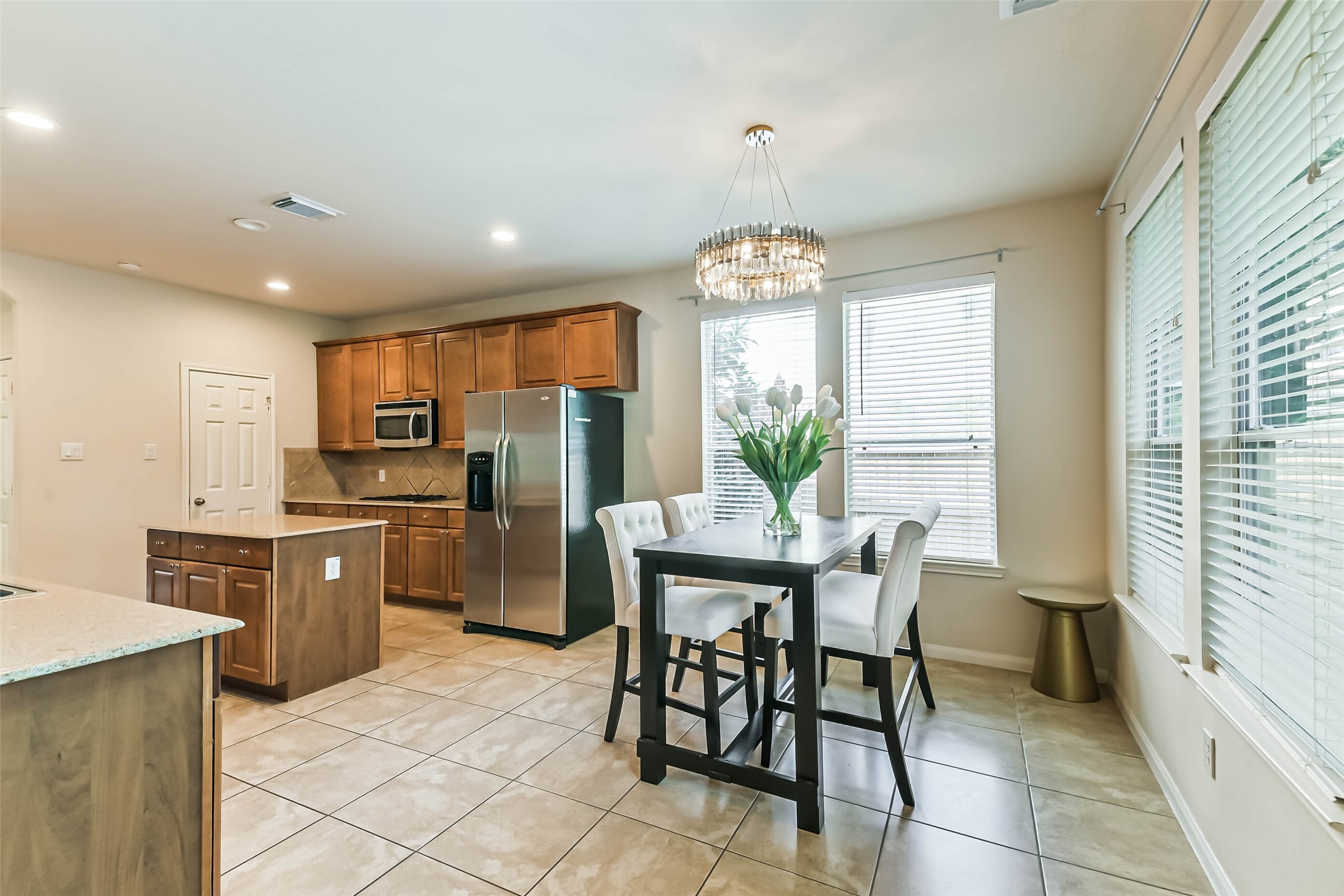 8718 Rolling Rapids Road Humble, TX 77346 - Photo 17 of 34 Breakfast area with upgraded lighting