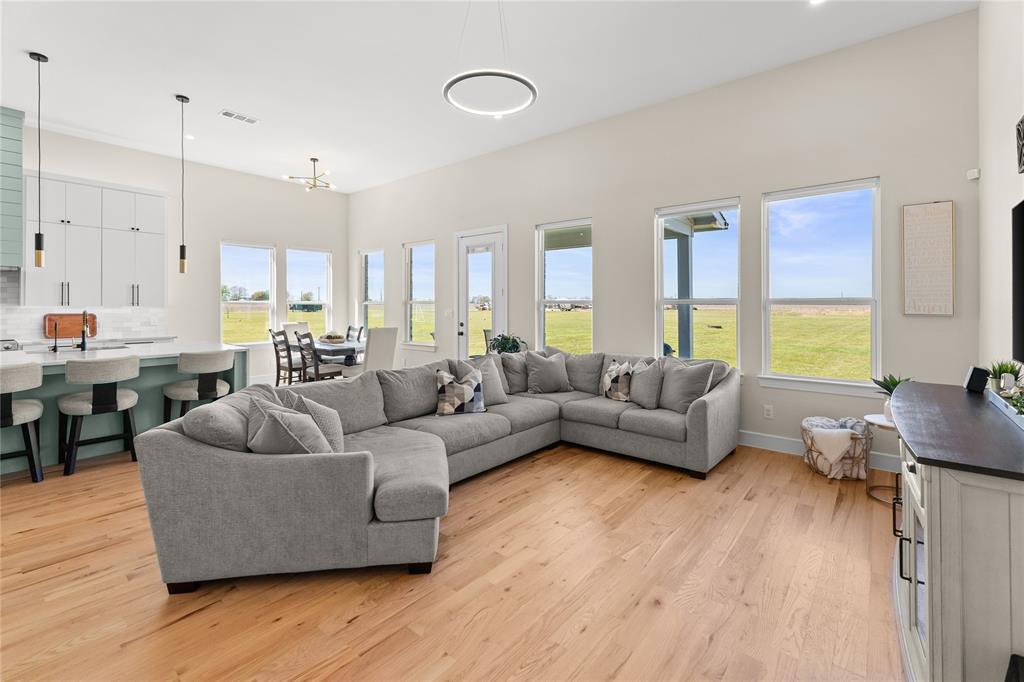 1568 County Road 3517 Quinlan, TX 75474 - Photo 13 of 30 a living room with furniture and a large window