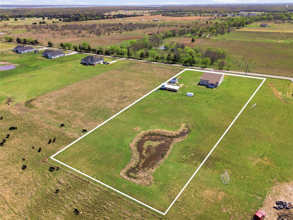 1568 County Road 3517 Quinlan, TX 75474 - Photo 27 of 30 a view of a tennis court