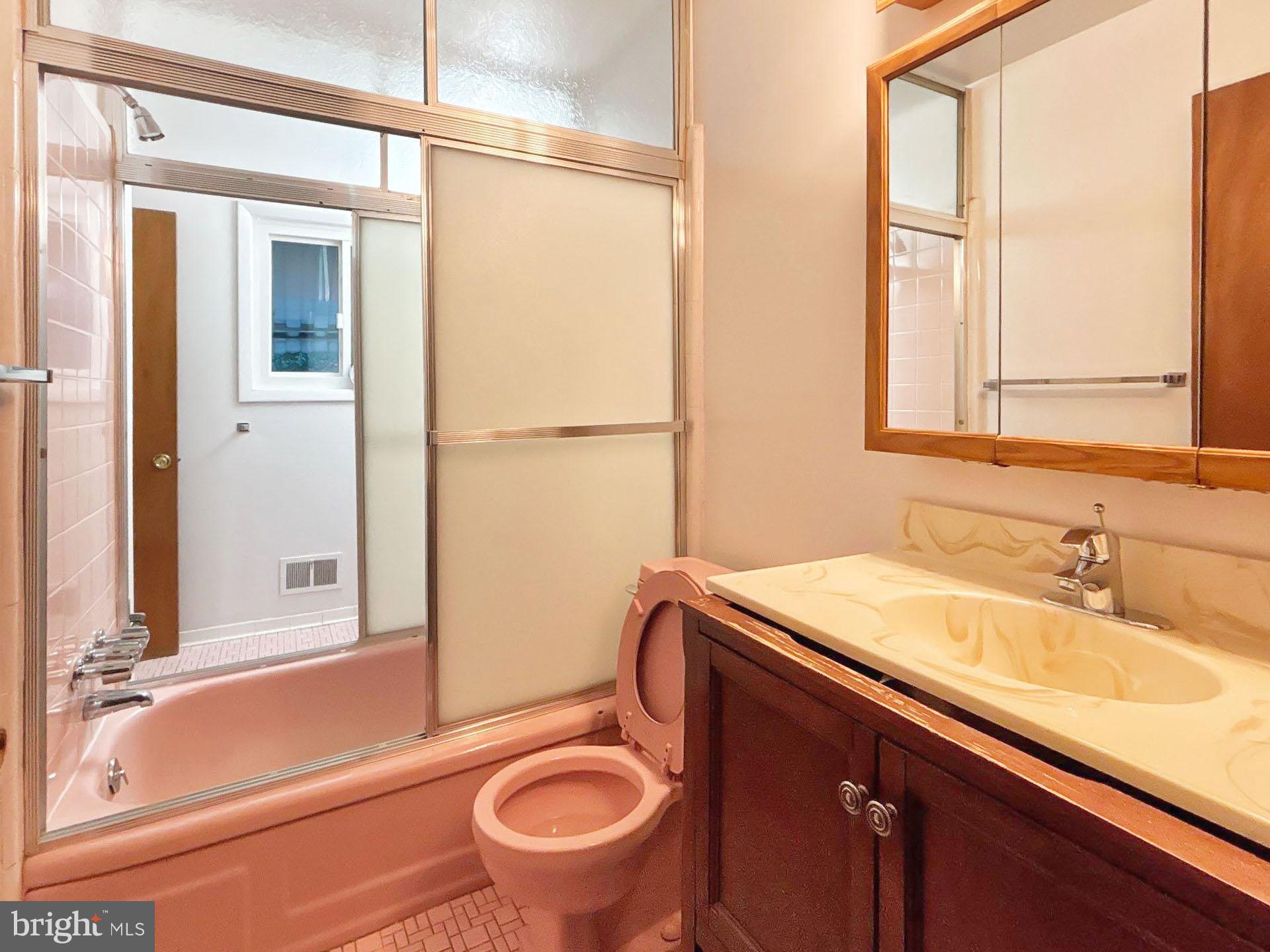 3323 Nash Place Southeast Washington, DC 20020 - Photo 14 of 23 a bathroom with a sink a toilet and a bathtub