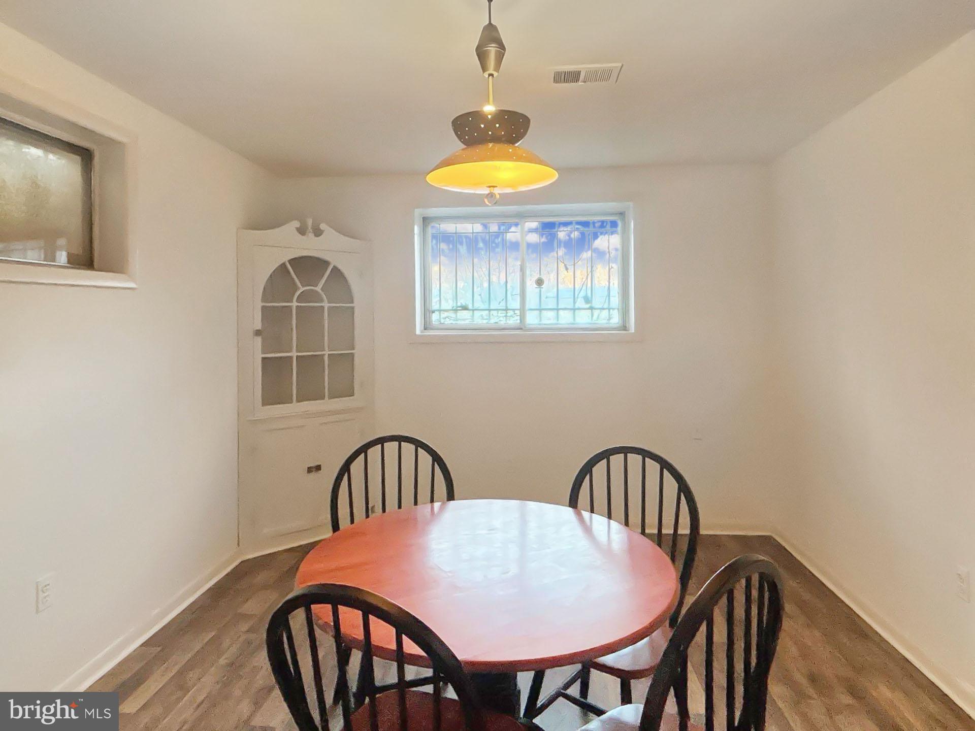 3323 Nash Place Southeast Washington, DC 20020 - Photo 16 of 23 a table and chairs in a room