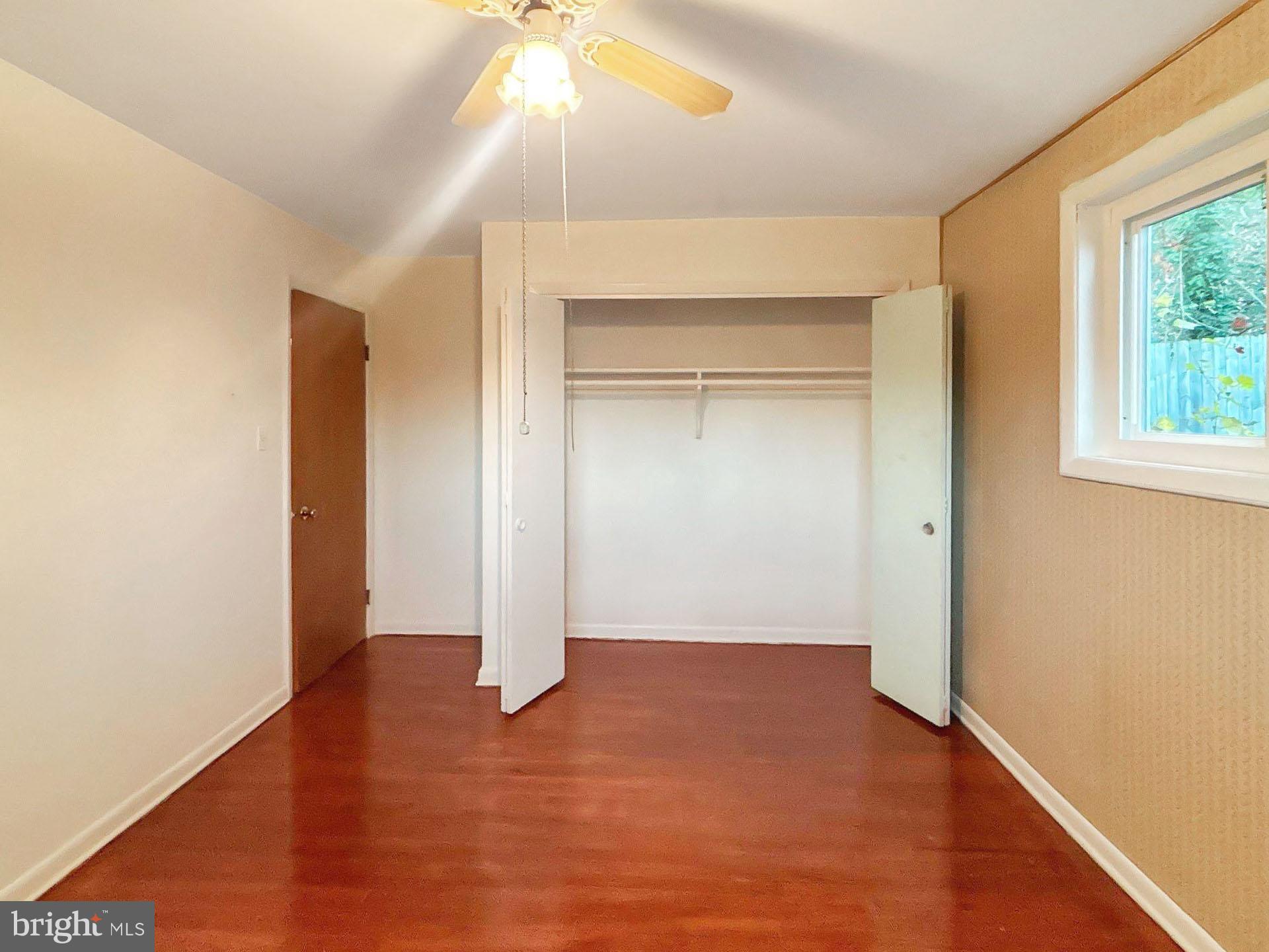 3323 Nash Place Southeast Washington, DC 20020 - Photo 7 of 23 an empty room with closet and windows