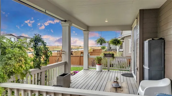 a view of balcony with furniture