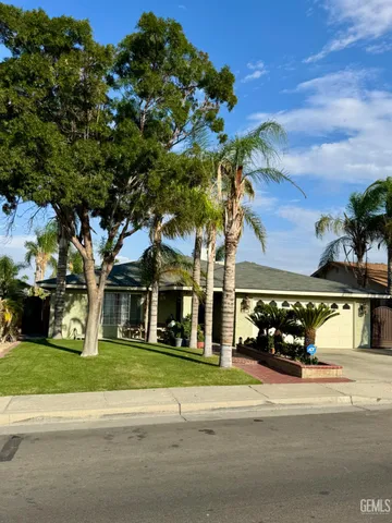a view of a building with a tree