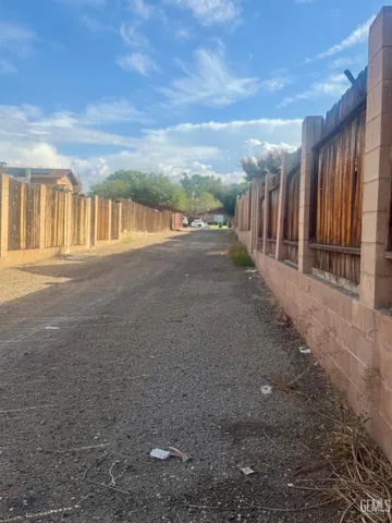 a view of a park with houses
