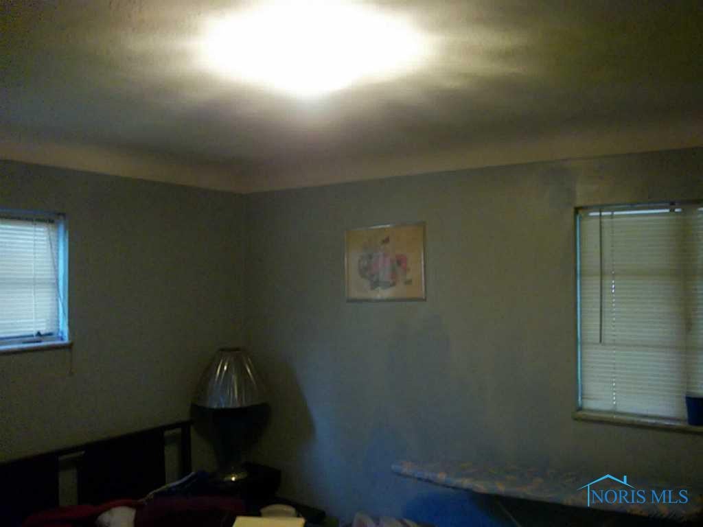 928 Secor Road Toledo, OH 43607 - Photo 12 of 13 Bedroom. crown molding detail in bedroom