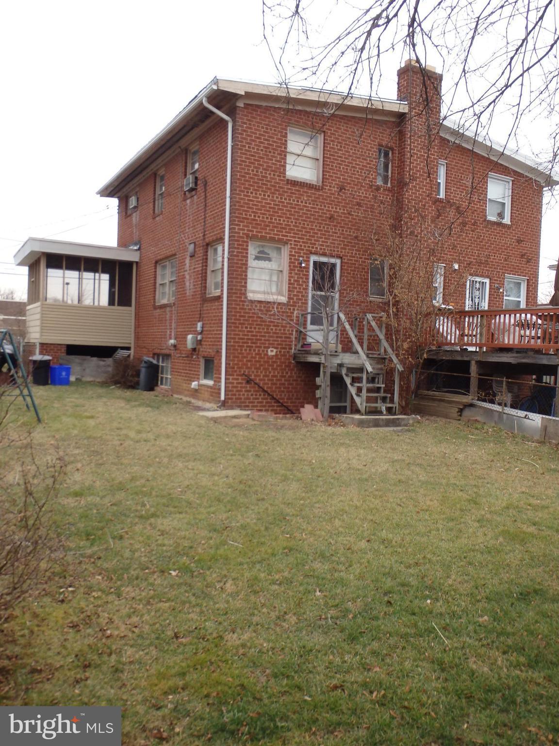 8713 Carroll Avenue Silver Spring, MD 20903 - Photo 2 of 12 Exterior (Rear)
