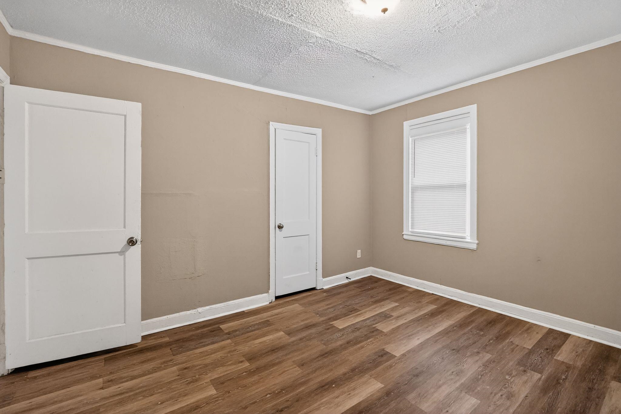 356 Hewlett Road Memphis, TN 38109 - Photo 24 of 30 a view of empty room with wooden floor