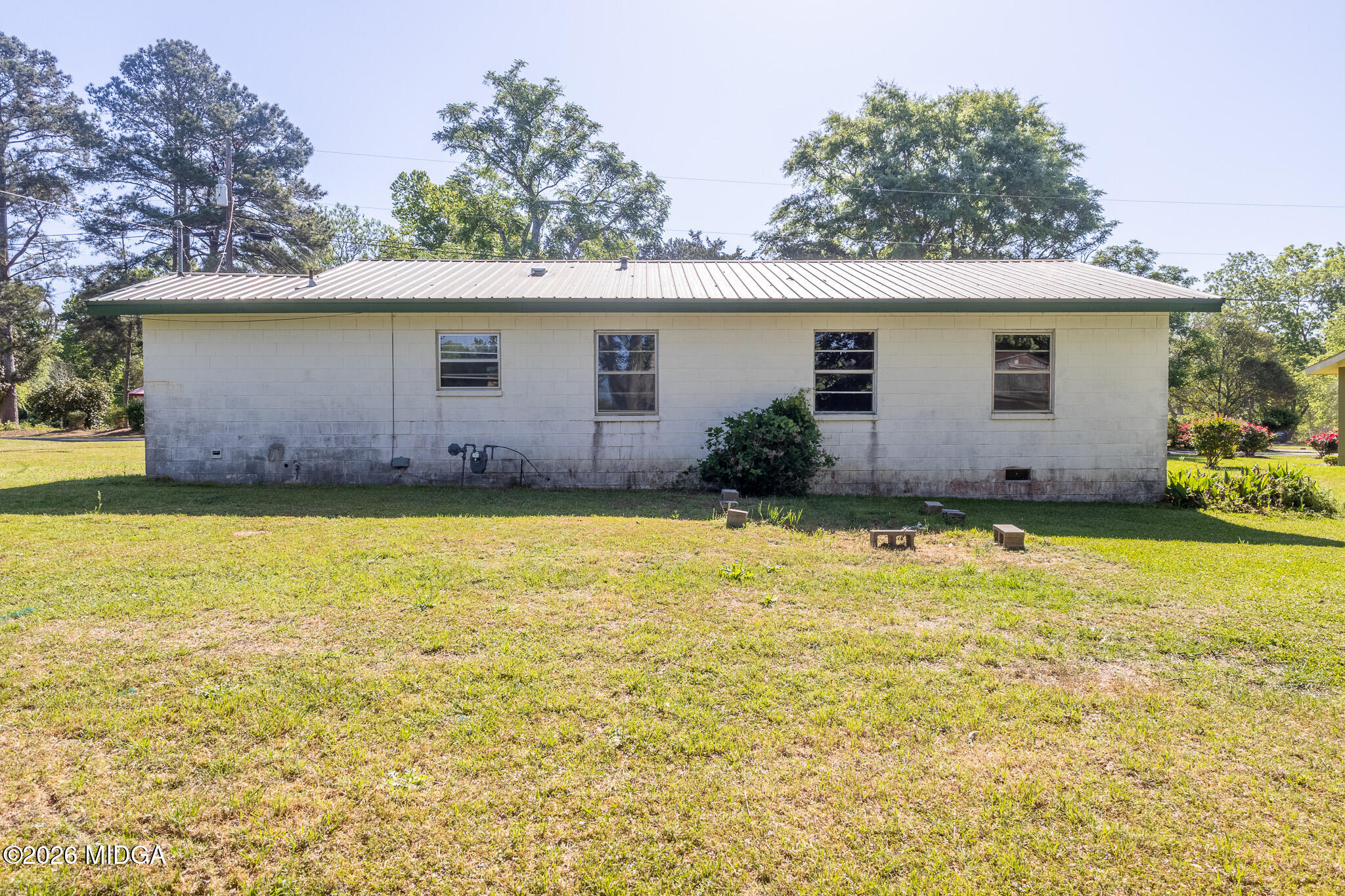 347 Peavy Street Unadilla, GA 31091 - Photo 13 of 15 a view of a backyard