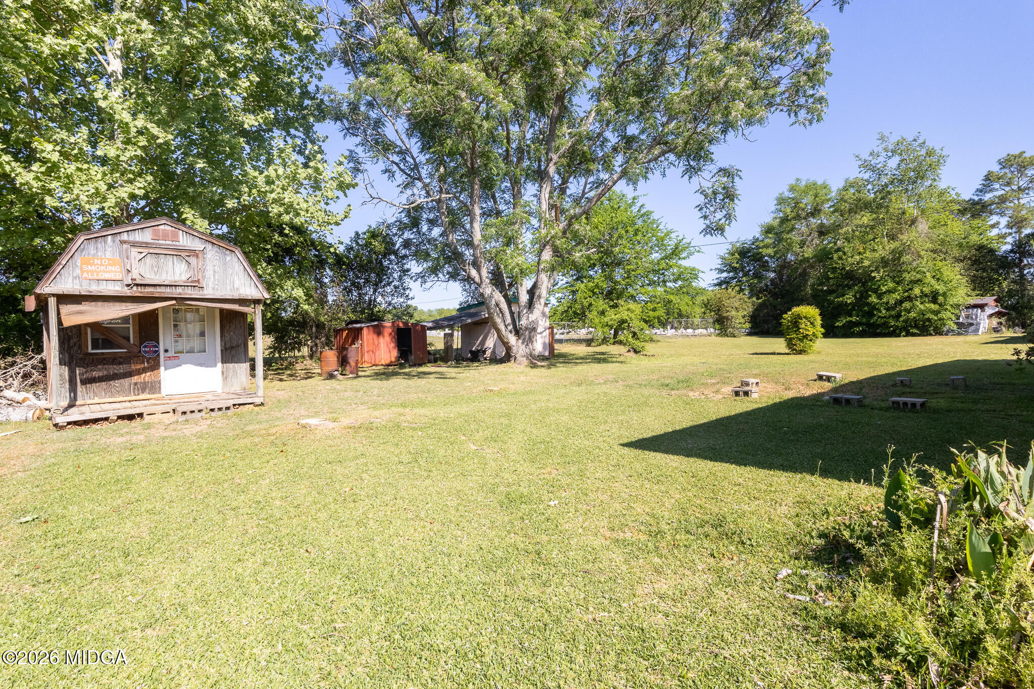 347 Peavy Street Unadilla, GA 31091 - Photo 15 of 15 a view of a swimming pool with an outdoor space