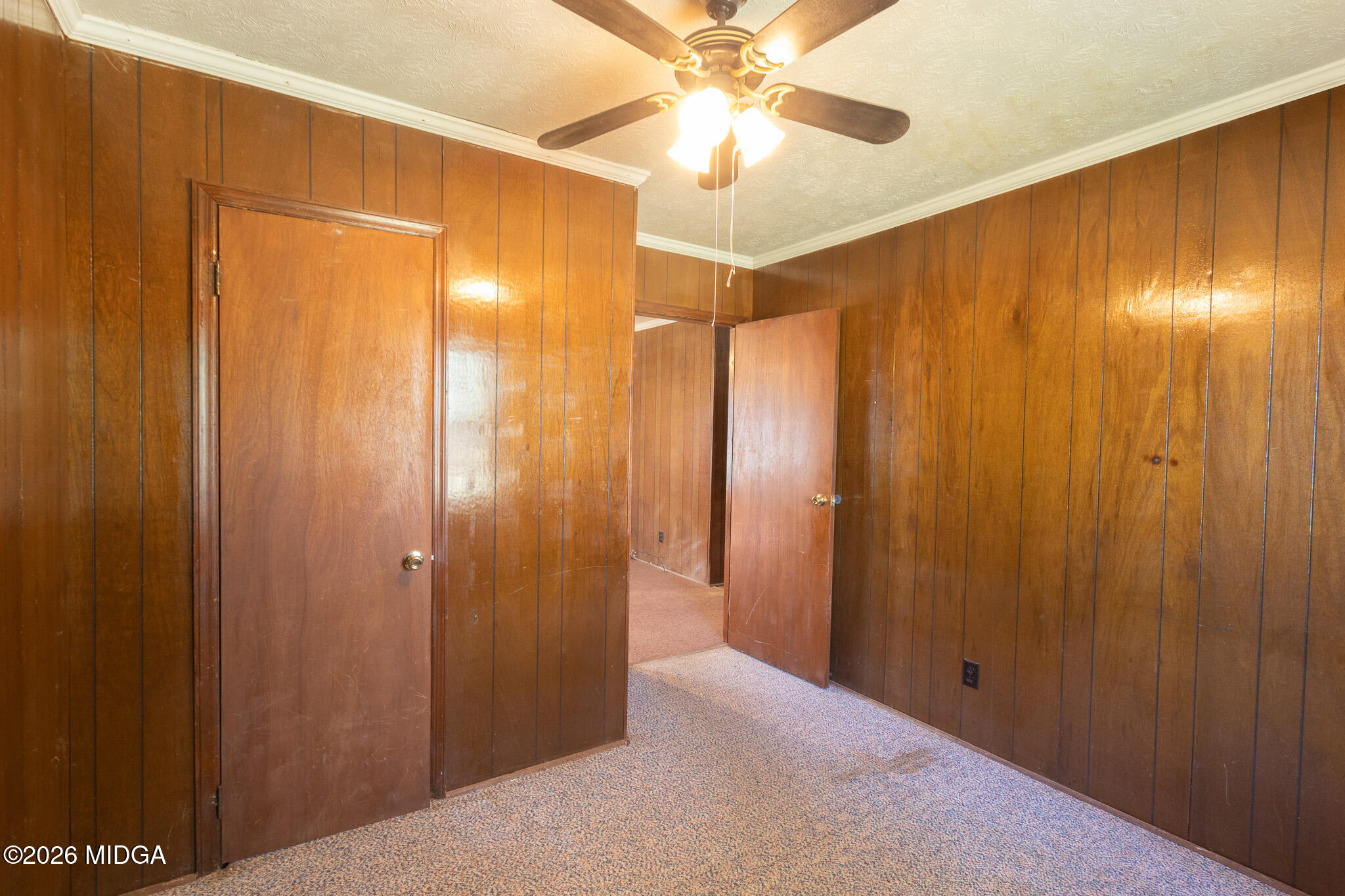 347 Peavy Street Unadilla, GA 31091 - Photo 7 of 15 a view of a bathroom with a shower and a mirror