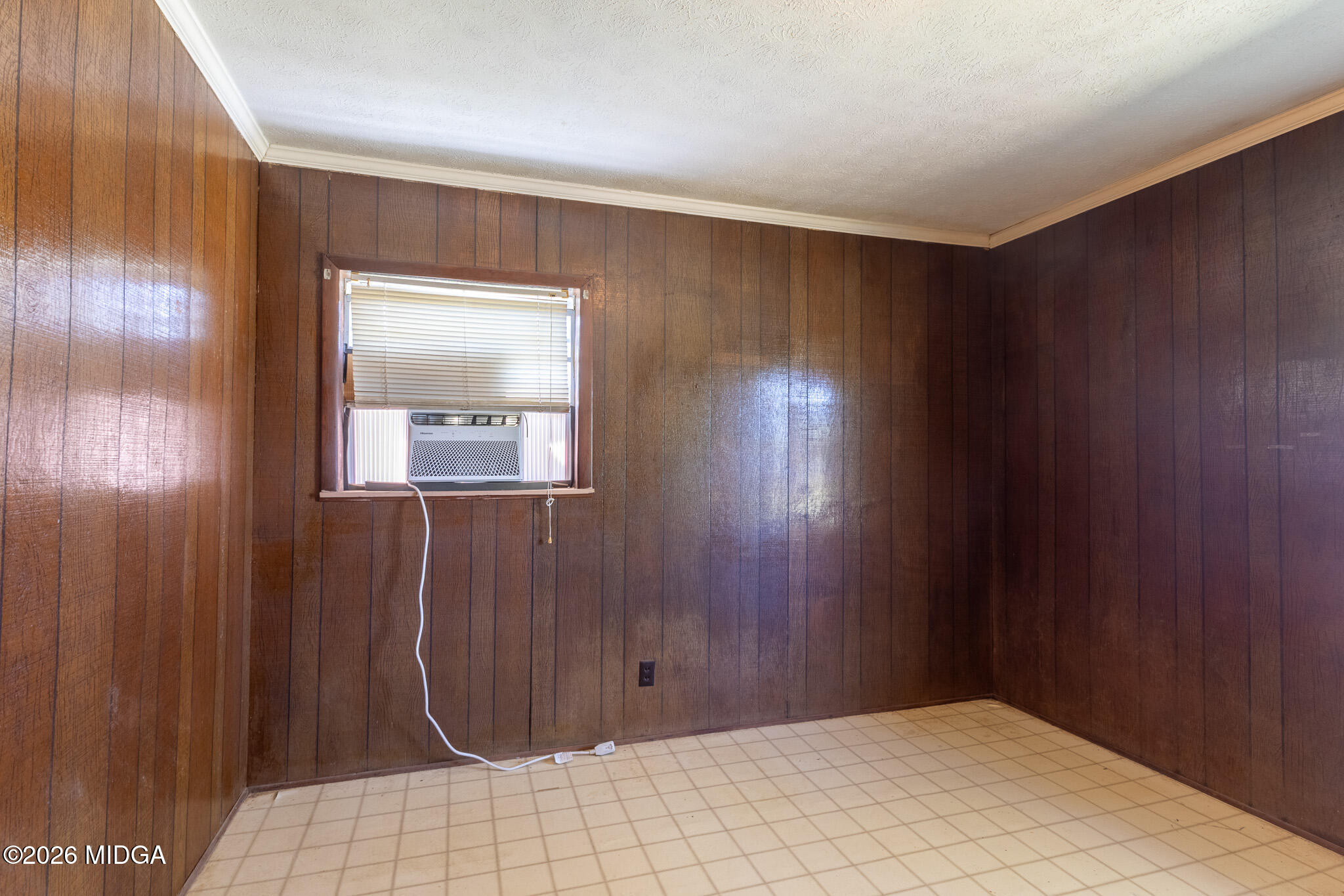 347 Peavy Street Unadilla, GA 31091 - Photo 8 of 15 a view of a room with wooden floor and windows