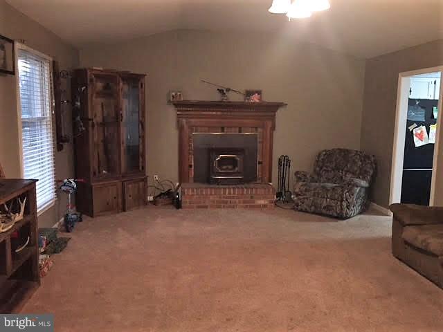 147 Morton Road Fredericksburg, VA 22405 - Photo 2 of 11 a living room with furniture and a fireplace