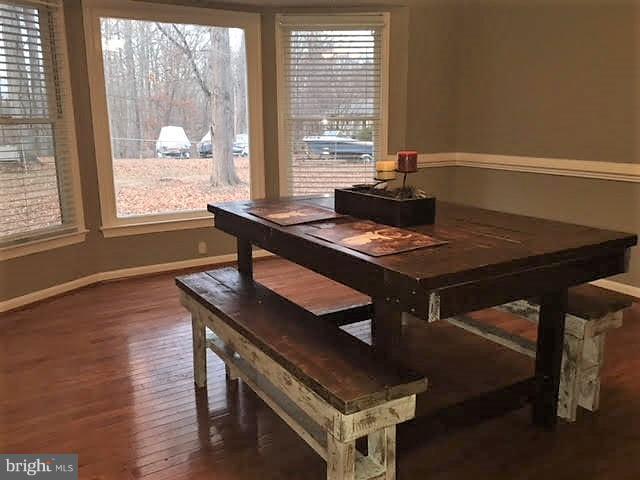 147 Morton Road Fredericksburg, VA 22405 - Photo 5 of 11 a view of a workspace with furniture and window