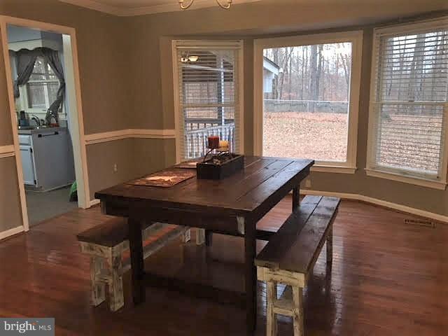 147 Morton Road Fredericksburg, VA 22405 - Photo 6 of 11 a view of a workspace with furniture and window