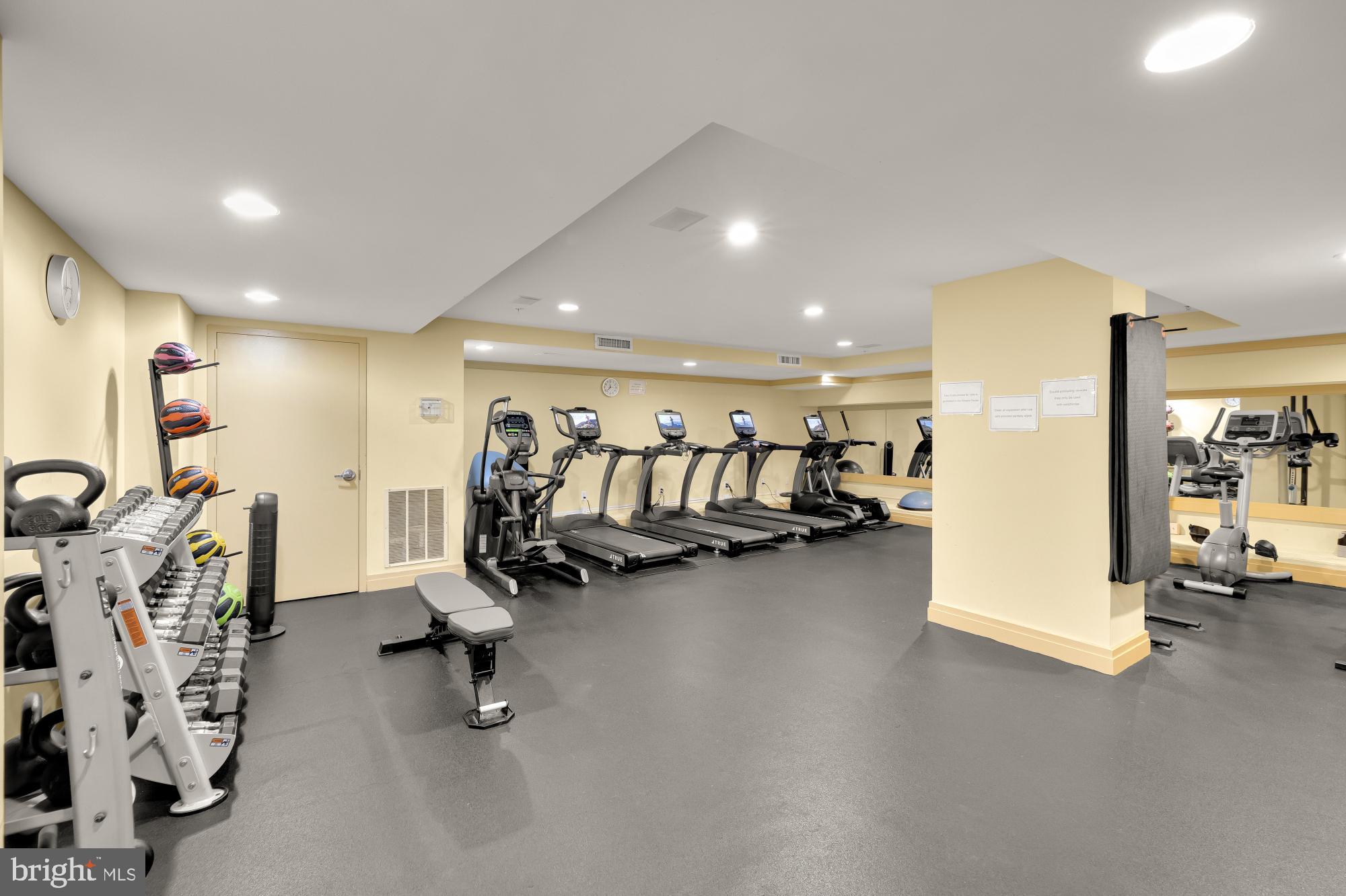915 E Street Northwest, Unit 815 Washington, DC 20004 - Photo 22 of 26 Fitness center with state of the art equipment.