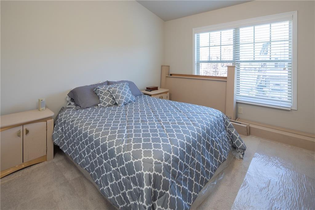 2865 Maple Park Place, Unit 44 Cumming, GA 30041 - Photo 11 of 18 a bedroom with a bed and window