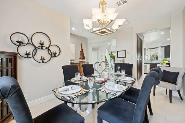 a view of living room and chandelier