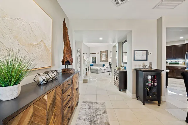 a bedroom with a bed and a mirror