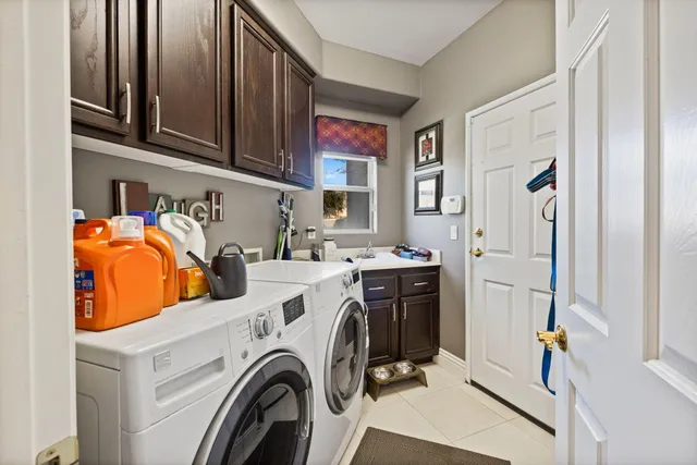 a bedroom with a bed and glass door