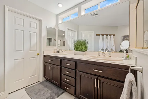 a view of a livingroom with furniture and windows