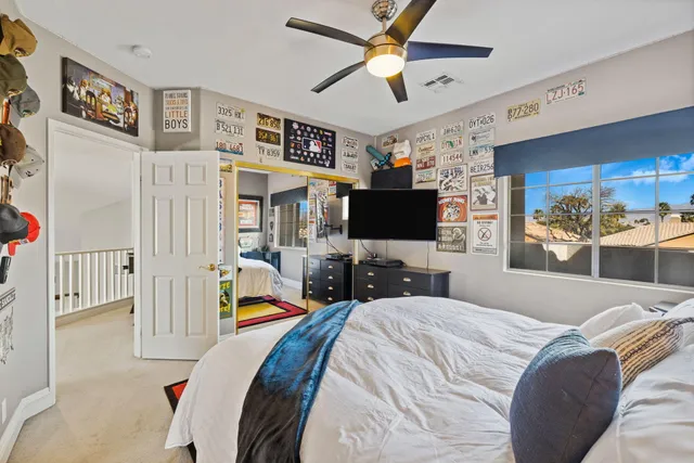 an aerial view of a residential houses with outdoor space