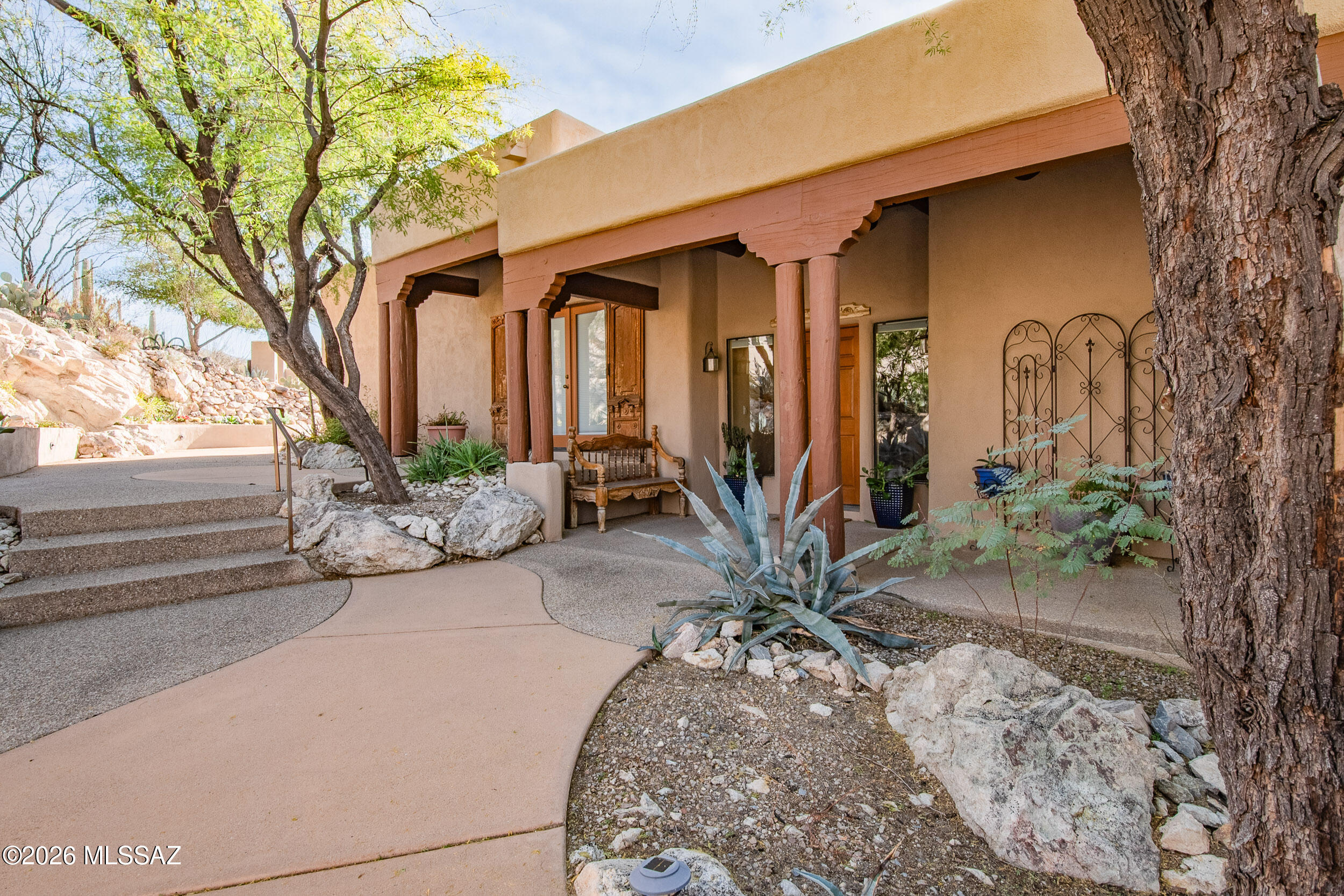 13630 East Sahuaro Sunset Road Tucson, AZ 85749 - Photo 39 of 47 a front view of a house