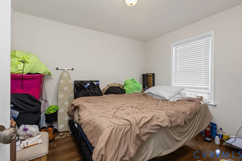 829 Rome Street Petersburg, VA 23803 - Photo 17 of 20 a bedroom with a bed and a couch