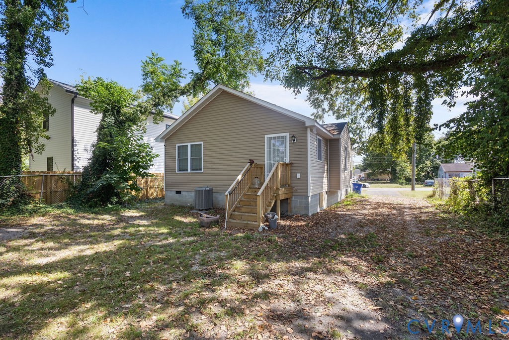 829 Rome Street Petersburg, VA 23803 - Photo 20 of 20 a view of a house with yard and a tree
