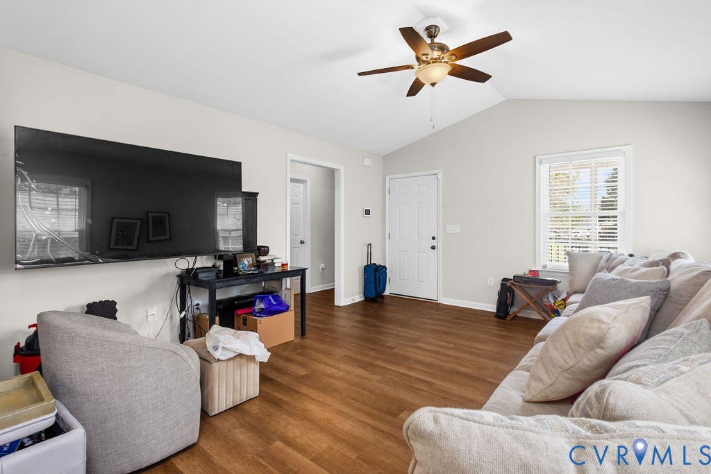 829 Rome Street Petersburg, VA 23803 - Photo 7 of 20 a living room with furniture and a flat screen tv